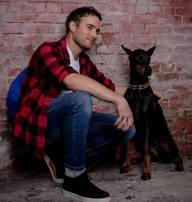 person meeting a friendly and well-behaved dog in a calm and relaxed setting demonstrating proper techniques for meeting a new dog